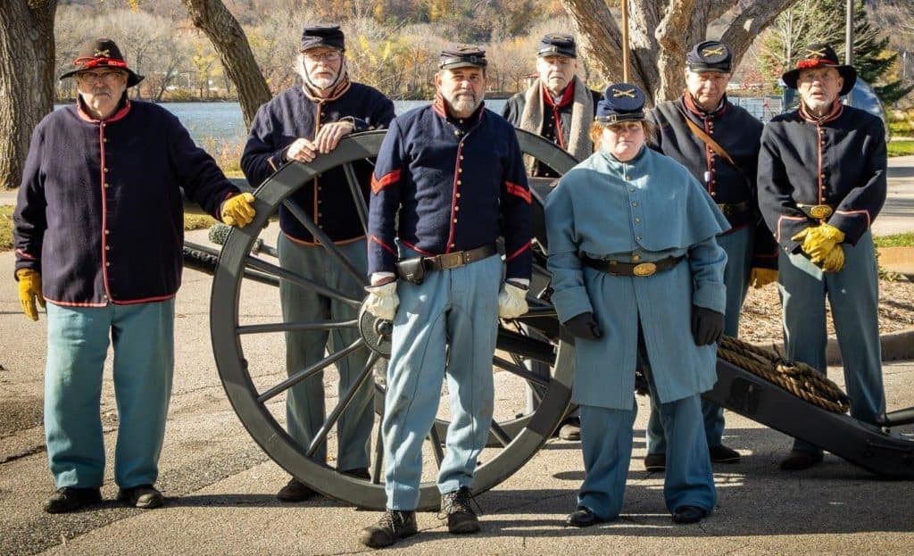 Castlerock Museum Re-Enactors Standing With An Old Artillery Gun