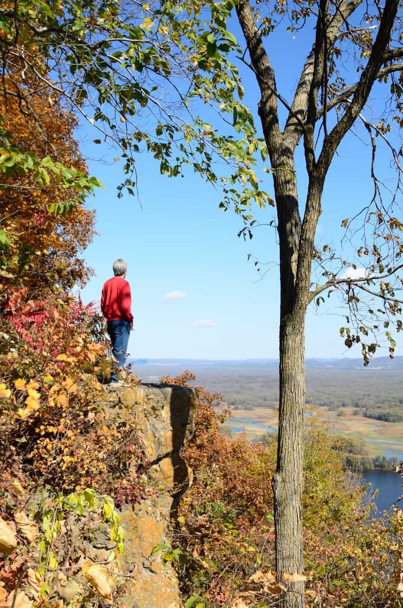 Man Standing On A Cliff Above The Mississippi River Gettyimages 580110936 Scaled - Wabasha-Kellogg Chamber &Amp; Cvb